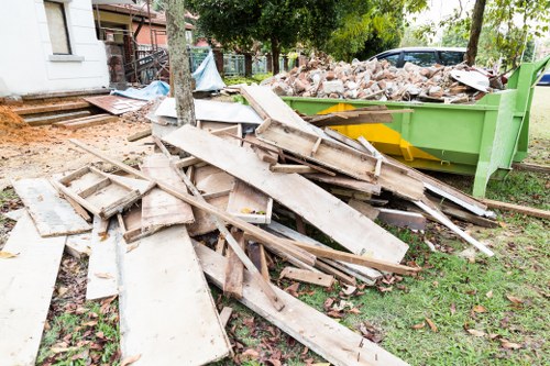 Professionals conducting flat clearance in Alperton