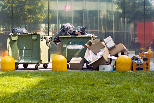 Workers managing construction debris for clearance